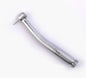 Silver dental airotor handpiece with bur on white background, high speed dental tool