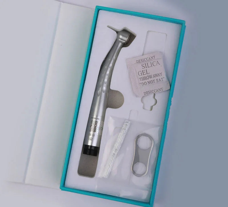 Dental handpiece kit with straight handpiece, silica gel pack, dental tools in a box