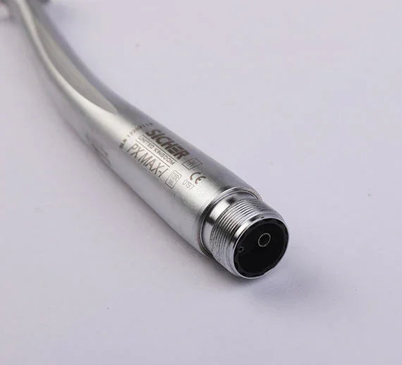 Close-up of a metallic dental airotor handpiece with ergonomic design on white background
